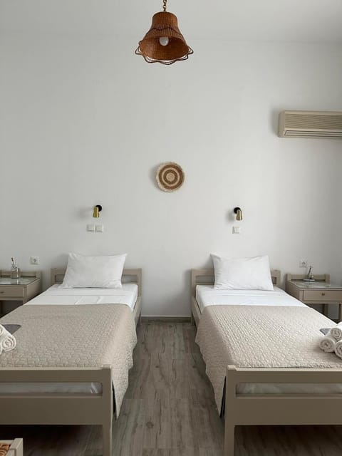 Bed, Photo of the whole room, Bedroom, towels, air conditioner