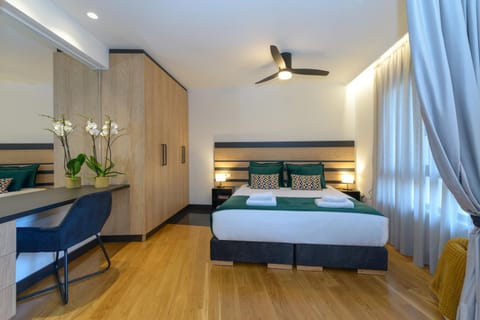 Bed, fireplace, towels, wardrobe