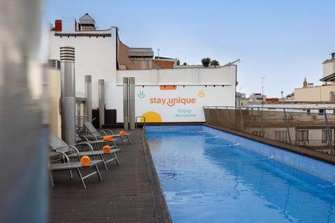 Property building, Day, Pool view, Swimming pool, sunbed