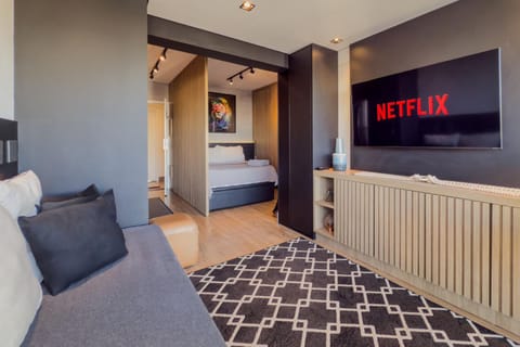 Communal lounge/ TV room, Bed, TV and multimedia, Living room, Photo of the whole room, Seating area