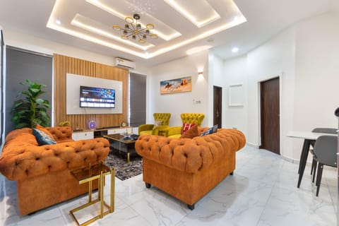Property building, TV and multimedia, Living room, Seating area, air conditioner, air conditioner