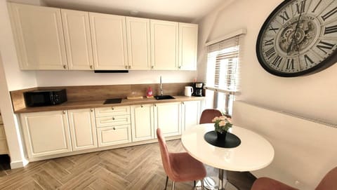 Dining area, minibar, stove