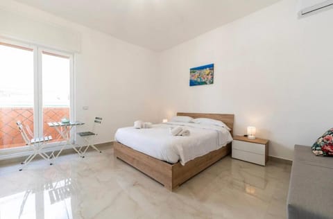 Photo of the whole room, Bedroom, towels, air conditioner