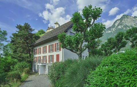 Property building, Spring, Day, Natural landscape, Mountain view