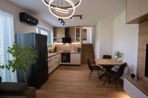Kitchen or kitchenette, Living room, Seating area, Dining area, dishwasher, oven, stove