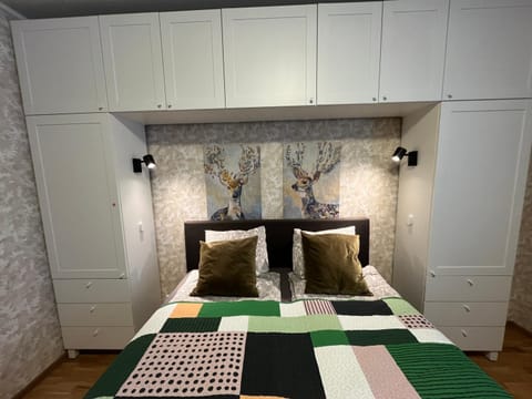 Bed, Living room, Seating area, Bedroom