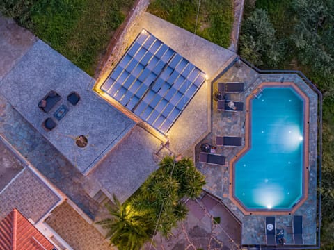 Property building, Patio, Day, Night, Pool view, Swimming pool, sunbed