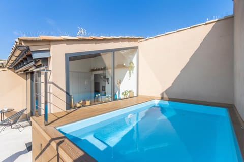 Property building, Living room, Swimming pool