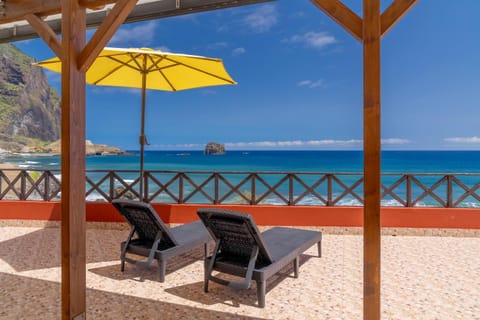 View (from property/room), Balcony/Terrace, Seating area, Beach, Sea view