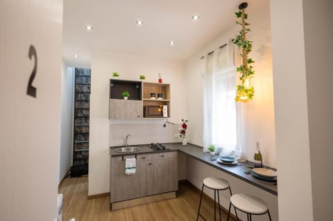 Kitchen or kitchenette, stove