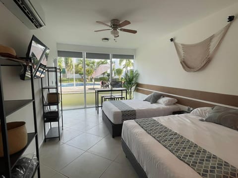 Bed, TV and multimedia, Bedroom, Pool view, fireplace, air conditioner