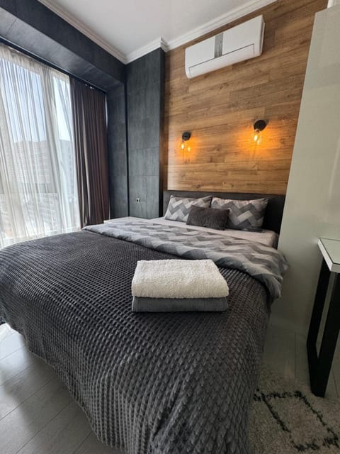 Bed, Photo of the whole room, Bedroom, towels, air conditioner