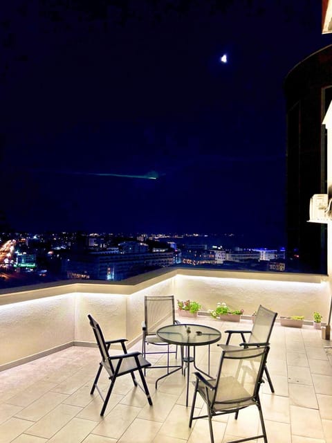 Patio, Night, Balcony/Terrace, Dining area, City view