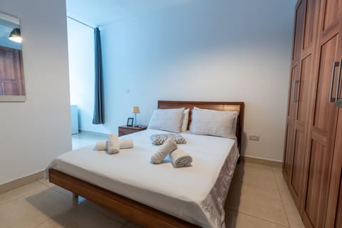 Bed, Photo of the whole room, Bedroom, towels, wardrobe