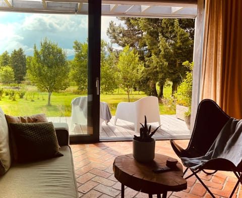 View (from property/room), Balcony/Terrace, Living room, Seating area, Garden view