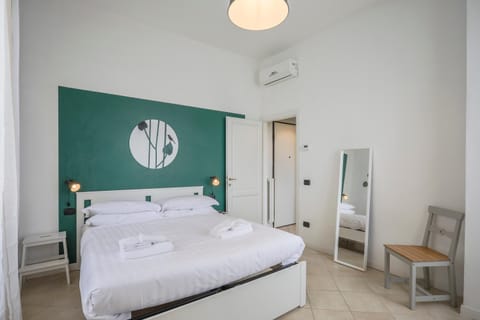 Bed, Bedroom, towels, air conditioner