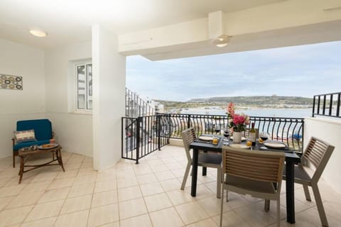 GhadiraBay seafront with sea views by Homely Apartment in Malta