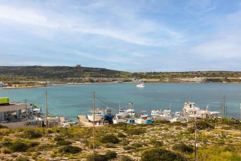 GhadiraBay seafront with sea views by Homely Apartment in Malta