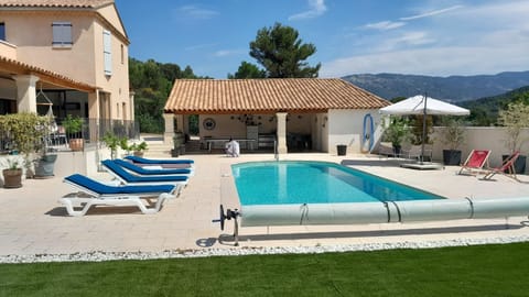 Property building, Living room, Swimming pool