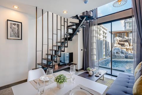 Living room, Seating area, Pool view