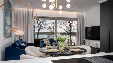 TV and multimedia, Living room, Seating area, Dining area, Lake view