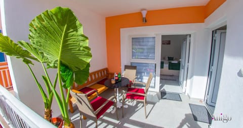 View (from property/room), Balcony/Terrace, Seating area, Dining area, Inner courtyard view