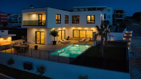 Property building, Night, View (from property/room), Balcony/Terrace, Pool view, Swimming pool, sunbed