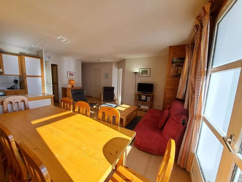 Bed, fireplace, kitchen