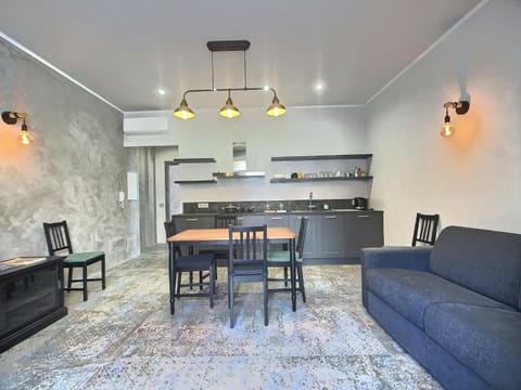 Kitchen or kitchenette, Living room, Seating area, Dining area