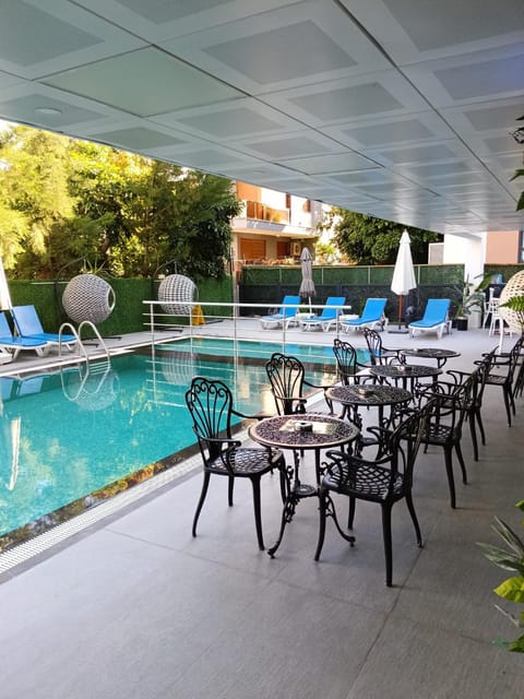 Patio, Day, Pool view, Swimming pool, sunbed