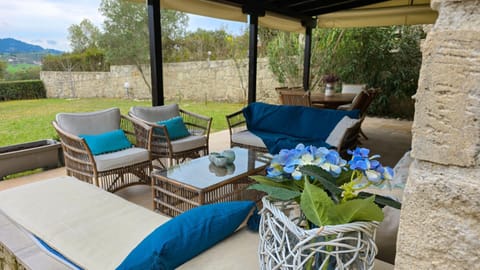 Patio, Natural landscape, Garden, Living room, Seating area, Garden view, Mountain view