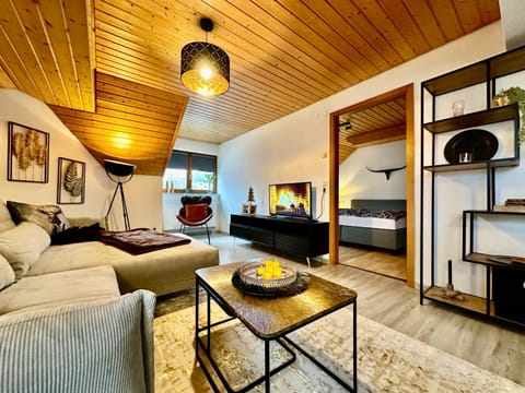 Bed, TV and multimedia, Living room, Photo of the whole room, Seating area