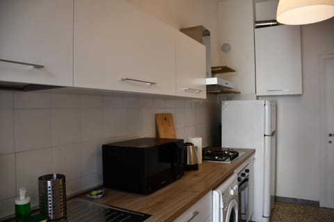 Kitchen or kitchenette, oven, stove