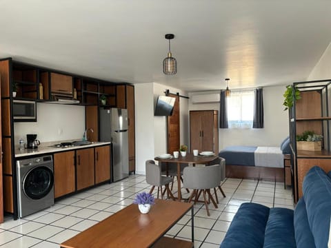 Kitchen or kitchenette, Living room, Dining area, minibar, stove, washing machine, dryer