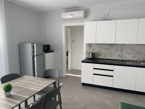 Kitchen or kitchenette, Living room, Dining area, microwave, stove