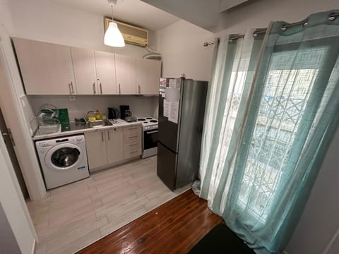 Kitchen or kitchenette, dishwasher, stove, washing machine