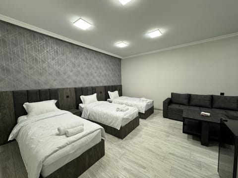 Bed, Photo of the whole room, Seating area, Bedroom, towels