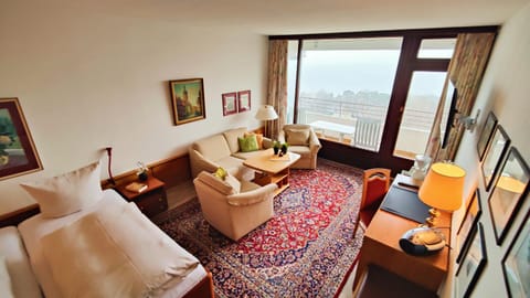 Bed, Living room, Seating area, Bedroom