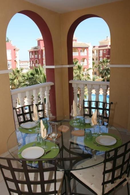 Patio, Day, Balcony/Terrace, Seating area, Dining area, Pool view