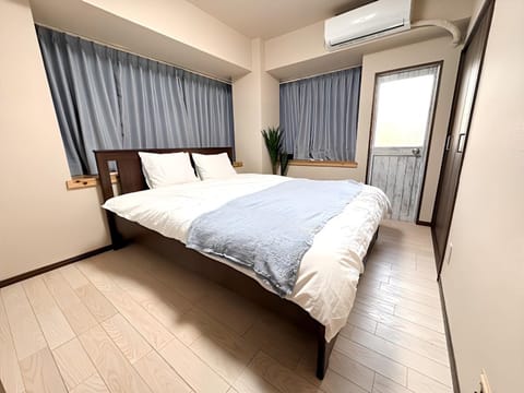 Bed, Balcony/Terrace, Bedroom, wardrobe, air conditioner