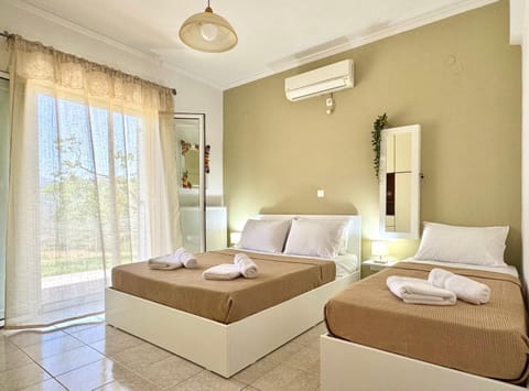 Bed, Photo of the whole room, Bedroom, towels, air conditioner