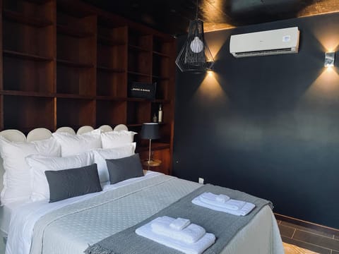 Bed, Photo of the whole room, Bedroom, towels, air conditioner