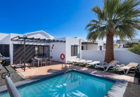 Property building, Living room, Swimming pool