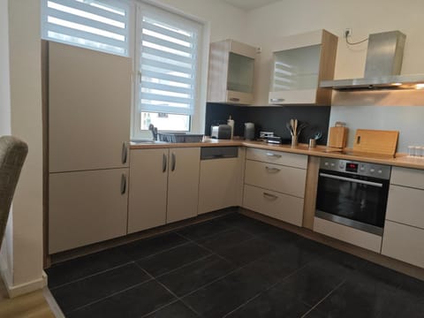 Kitchen or kitchenette, stove, kitchen