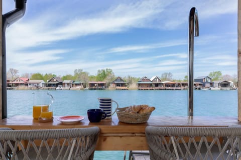 View (from property/room), Balcony/Terrace, Dining area, River view