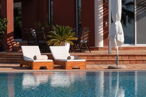 Patio, Day, Pool view, Swimming pool, sunbed