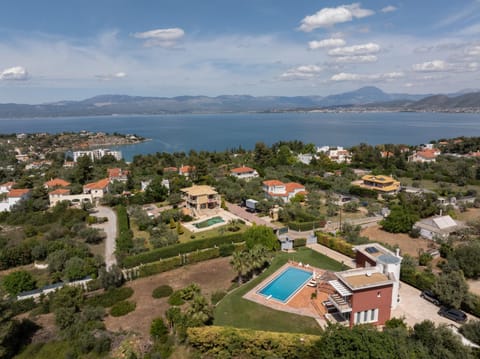 Property building, Nearby landmark, Day, Neighbourhood, Natural landscape, Bird's eye view, Pool view, Sea view, Swimming pool