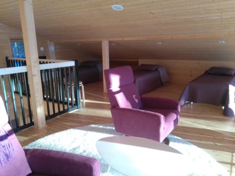 Communal lounge/ TV room, Bed, Seating area