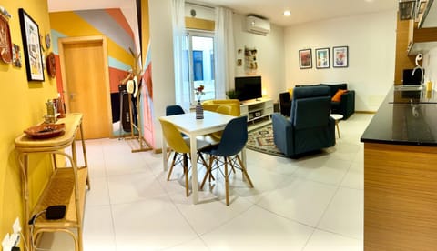 Kitchen or kitchenette, Living room, Seating area, air conditioner