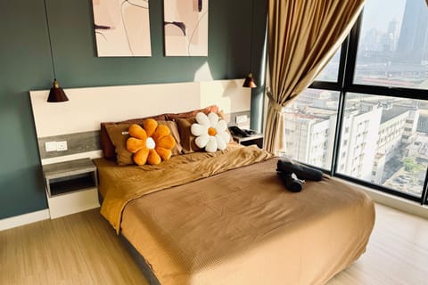 Bed, Photo of the whole room, Bedroom, hair dryier, towels, air conditioner